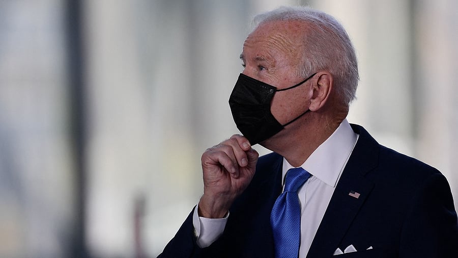 US President Joe Biden prepares to pose for a group photo of world leaders at the G20 of World Leaders Summit on October 30, 2021 at the convention center "La Nuvola" in the EUR district of Rome. Credit: AFP Photo