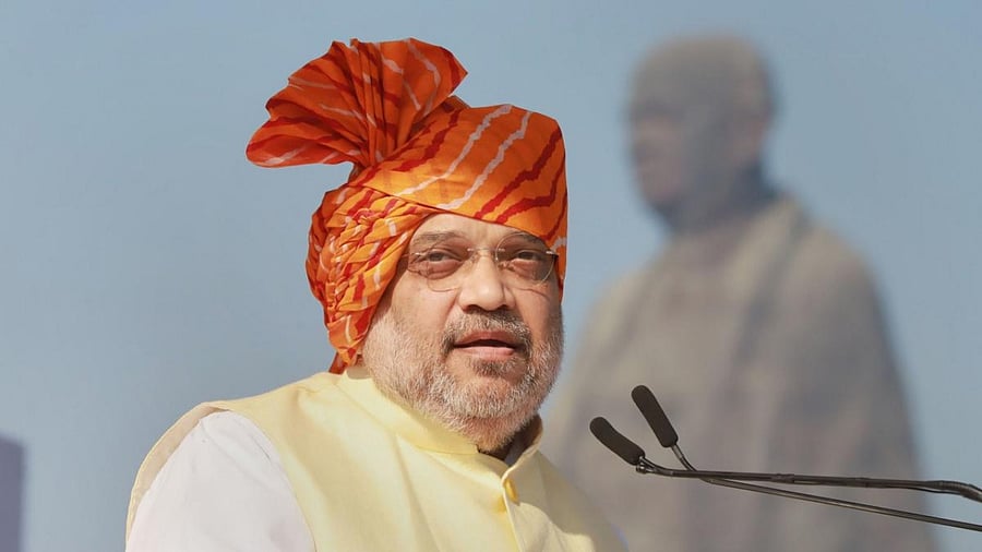 Union Home and Cooperation Minister, Amit Shah addresses on the occasion of the Rashtriya Ekta Diwas, to commemorate the Birth Anniversary of Sardar Vallabhbhai Patel, at Statue of Unity. Credit: PTI Photo