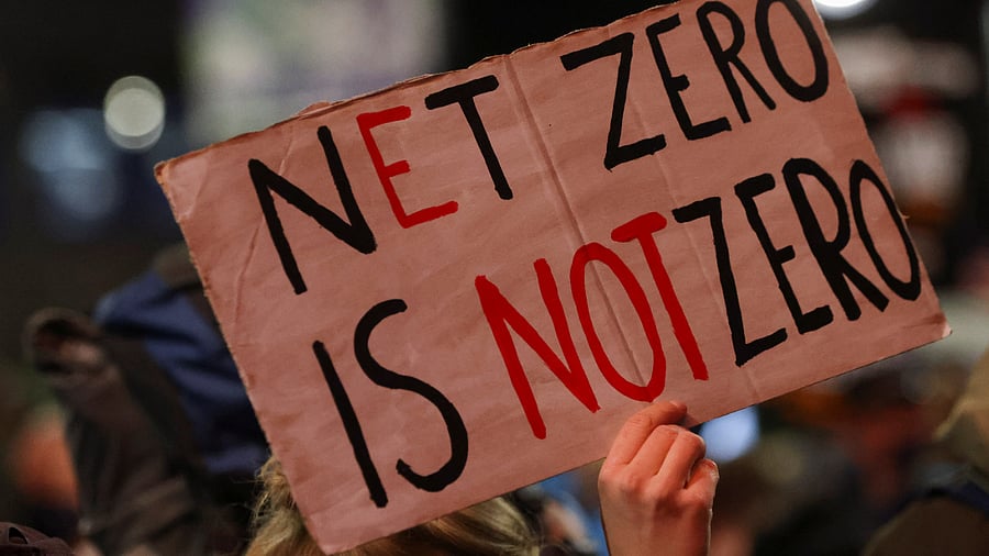 Climate activists protest at Glasgow Central Station, ahead of COP26. Credit: Reuters Photo