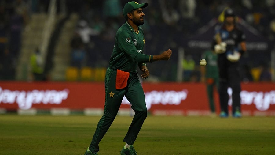 Pakistan captain Babar Azam's two successive half-centuries in the T20 World Cup have helped him overtake England's Dawid Malan and grab the No. 1 position for batters. Credit: AFP Photo