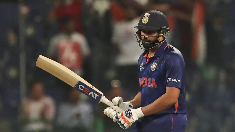 Rohit Sharma reacts after scoring 50 runs during the Cricket Twenty20 World Cup match between India and Afghanistan in Abu Dhabi. Credit: AP/PTI Photo