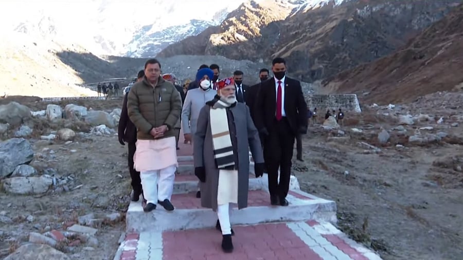 Modi was received at the Dehradun airport by Uttarakhand Governor Lt Gen Gurmit Singh (retd), Chief Minister Pushkar Singh Dhami and his cabinet colleagues. Credit: Twitter/@BJP4India