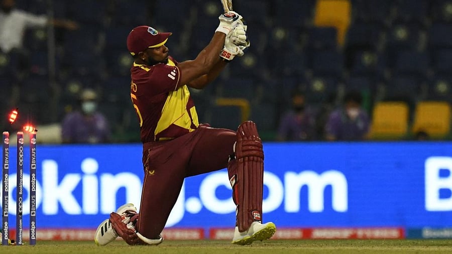 West Indies' captain Kieron Pollard is bowled out by Sri Lanka's Wanindu Hasaranga de Silva (not pictured) during the ICC men’s Twenty20 World Cup cricket match between West Indies and Sri Lanka at the Sheikh Zayed Cricket Stadium. Credit: AFP Photo