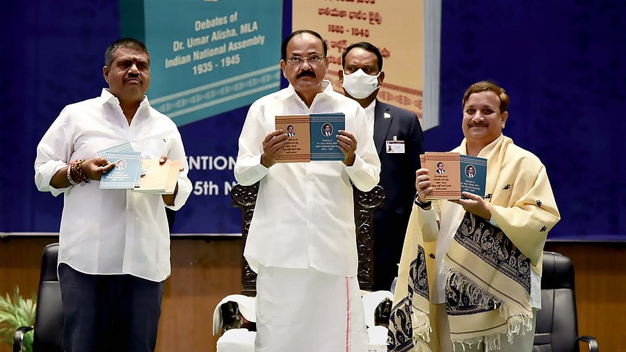 Vice President Venkaiah Naidu releases a book on the life and parliamentary debates of Umar Alisha in Visakhapatnam. Credit: PTI Photo