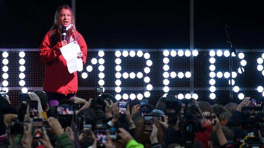 Swedish climate activist Greta Thunberg speaks to the crowd in George Square the end point for the Fridays For Future rally in Glasgow, Scotland on November 5, 2021, venue of the COP26 UN Climate Change Conference being held in the city. Credit: AFP Photo
