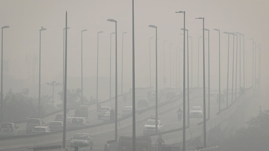 Traffic moves on a flyover on a smoggy morning in New Delhi. Credit: Reuters File Photo