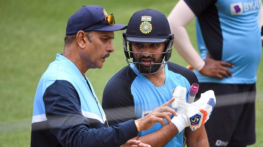 <div class="paragraphs"><p> Ravi Shastri (L) with Rohit Sharma. </p></div>