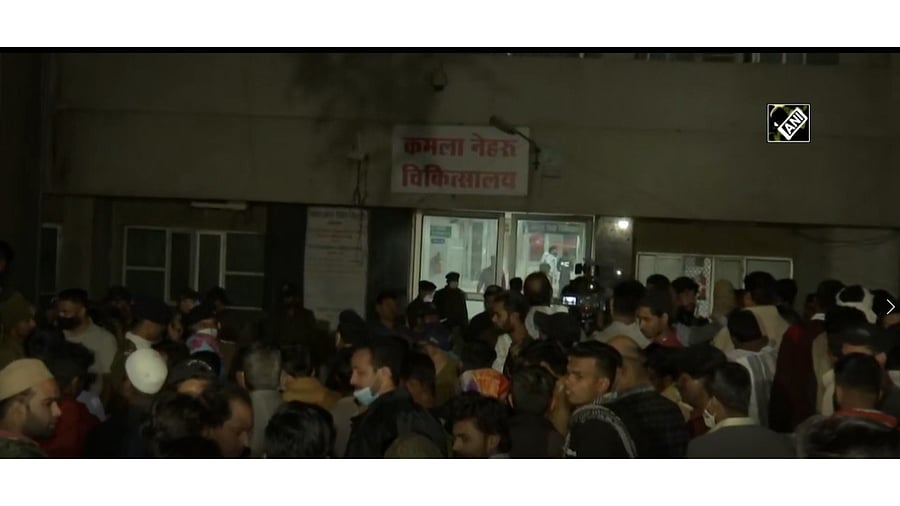 People gather outside the Kamala Nehru Children's Hospital where four children died in a fire in Bhopal. Credit: Screengrab via ANI video