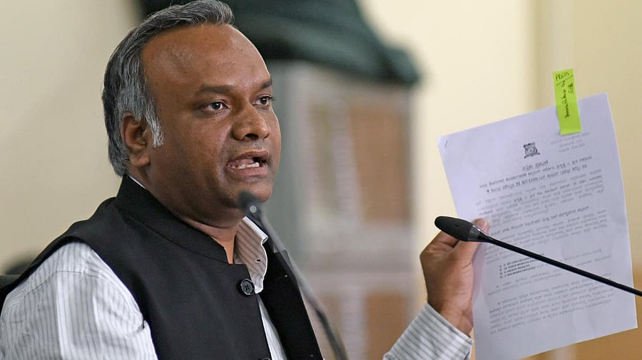 Congress leader Priyank Kharge address the media over alleged bitcoin scam in Bengaluru on Friday. Credit: PushkarV/DH Photo