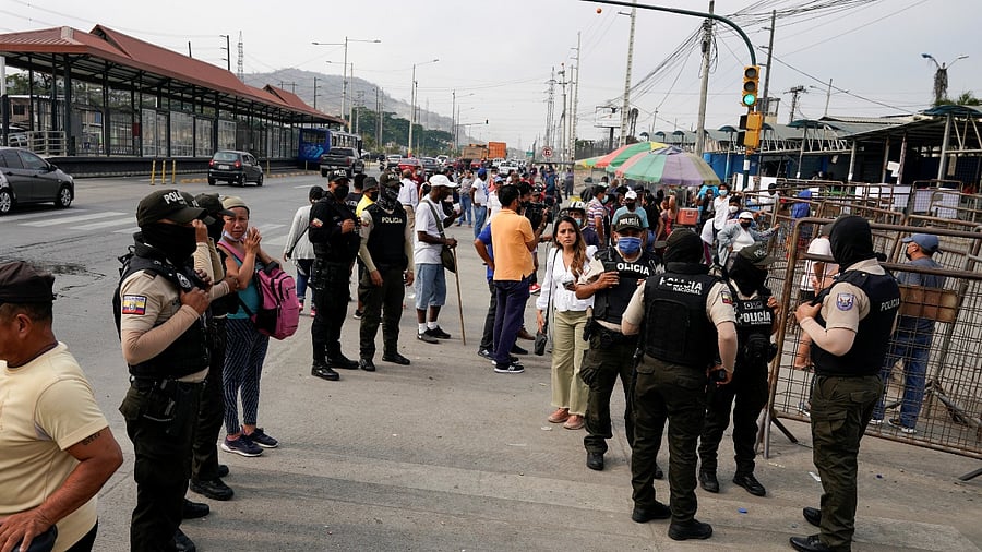 Family members gather outside Penitenciaria del Litoral prison in Guayaquil. Credit: Reuters Photo