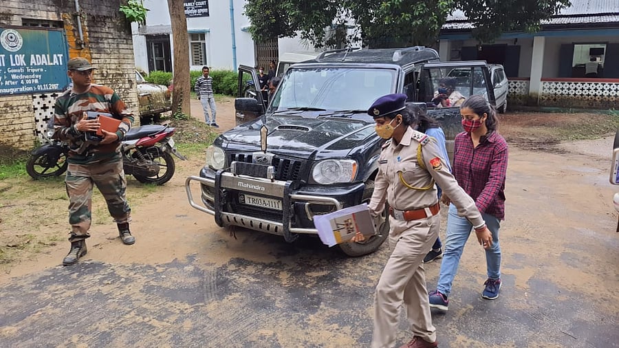 Two Mumbai-based journalists while being produced in a court at Udaipur. Credit: DH special arrangement