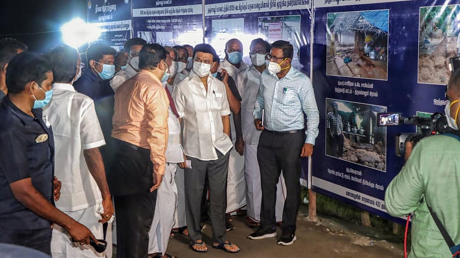 Tamil Nadu Chief Minister MK Stalin inspects the flood affected areas in the Periyakottai area next to Madukkurai in Thanjavur district. Credit: PTI photo
