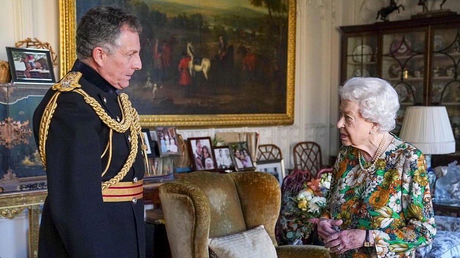 Britain's Queen Elizabeth II greets Britain's Chief of the Defence Staff, General Nick Carter, during an audience at Windsor Castle, west of London. Credit: AFP Photo
