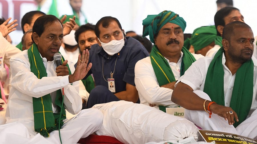 Telangana Rashtra Samithi (TRS) party president and Chief Minister of the Telangana state K. Chandrashekar Rao (L) participate in a protest along with all ministers, state legislators, MPs and other elected representatives of the ruling party against the central governement on the paddy procurement issue, in Hyderabad. Credit: PTI Photo