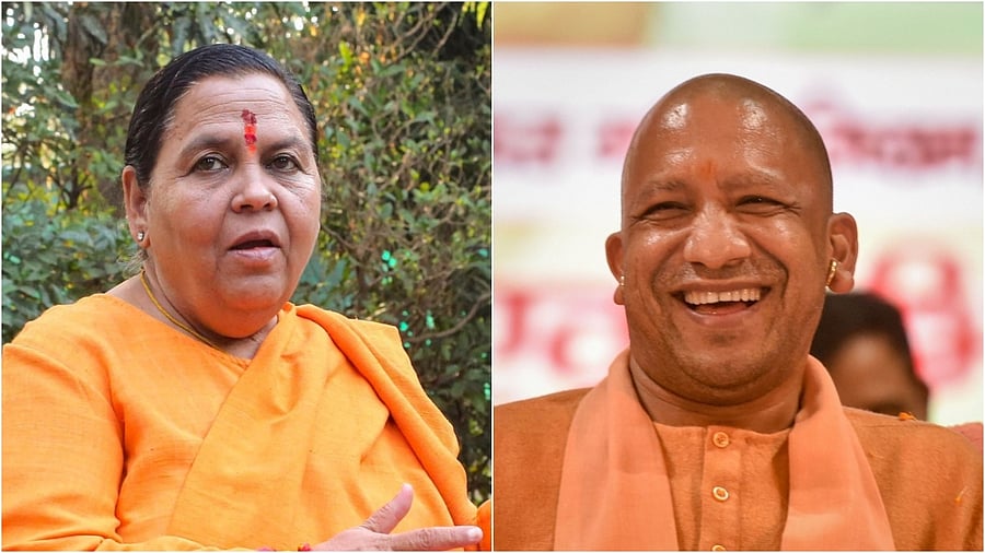 Senior BJP leader Uma Bharati and UP CM Yogi Adityanath. Credit: PTI Photos