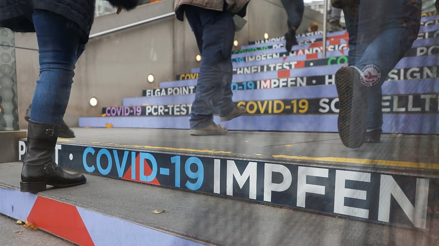 People walk towards a vaccination center during the coronavirus disease (COVID-19) outbreak, as Austria's government has imposed a lockdown on people who are not fully vaccinated. Credit: Reuters Photo