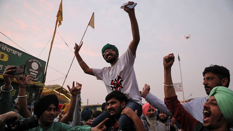 Farmers celebrate after the farm laws were repealed. Credit: Reuters Photo