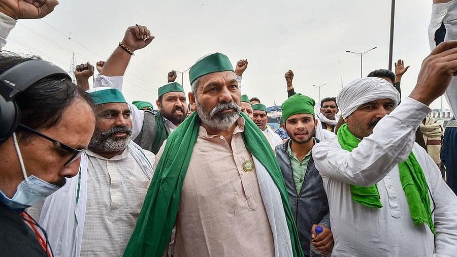 Bhartiya Kisan Union (BKU) leader Rakesh Tikait with farmers at Ghazipur border in New Delhi. Credit: PTI photo