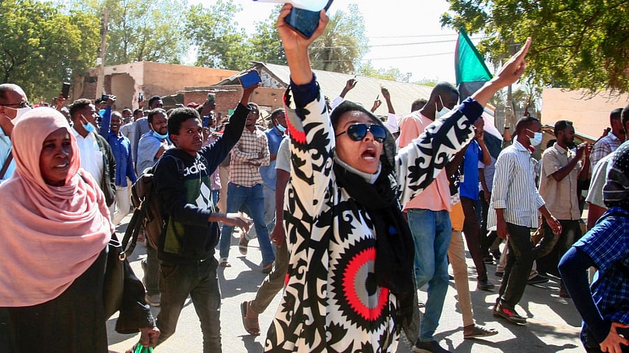Sudanese protesters gesture during a demonstration calling for a return to civilian rule in the capital Khartoum. Credit: AFP File Photo