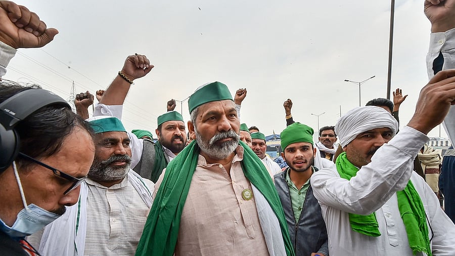 Bharatiya Kisan Union (BKU) leader Rakesh Tikait (C). Credit: PTI File Photo