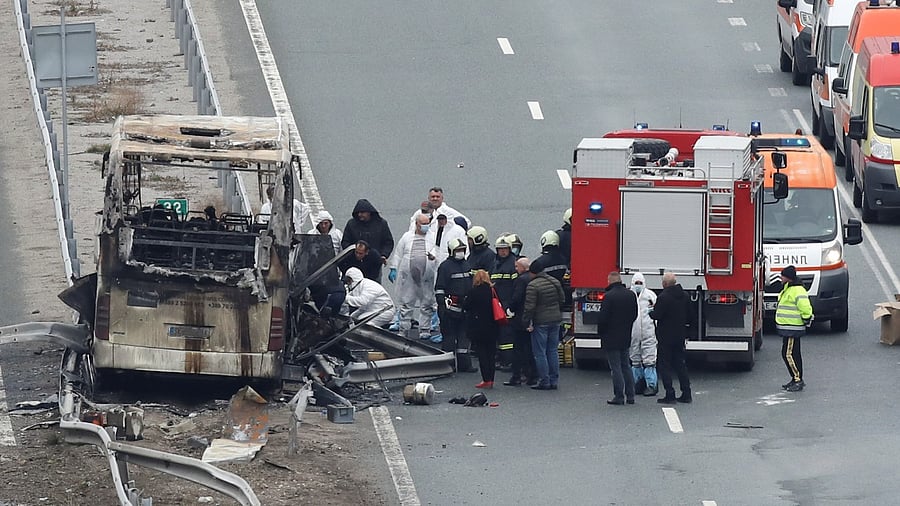 A view shows the site where a bus with North Macedonian plates caught fire on a highway, near the village of Bosnek, Bulgaria. Credit: Reuters Photo