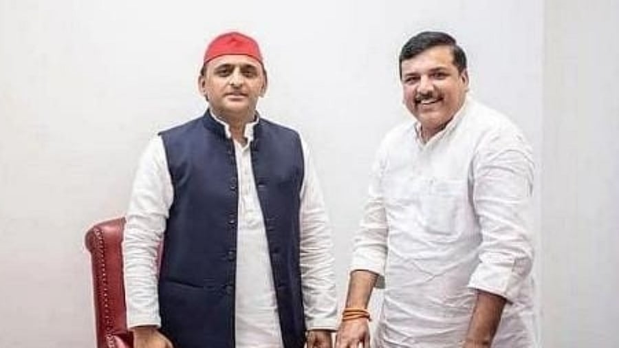 Akhilesh Yadav and Sanjay Singh. Credit: IANS File Photo