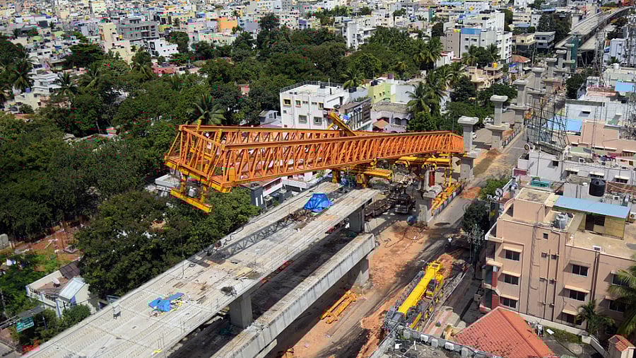 A launching gantry collapsed due to mechanical failure, at an ongoing metro construction worksite, near Udupi Garden Signal in BTM Layout. Credit: DH Photo