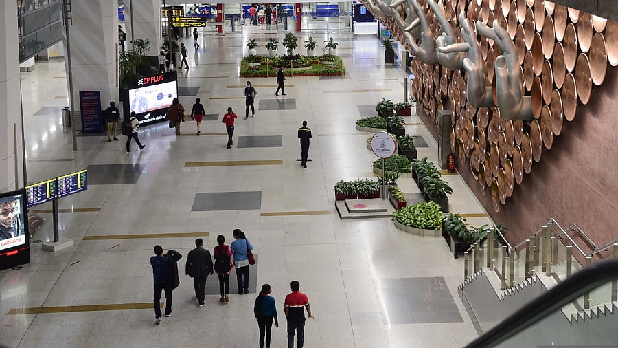 <div class="paragraphs"><p>Passengers at Terminal 3 of the Delhi airport. </p></div>