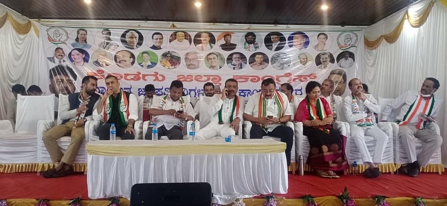 Congress candidate Mantar Gowda, KPCC spokesperson A S Ponnanna, DCC president Dharmaja Uthappa, MLC Veena Achaiah at a meeting in Madikeri.