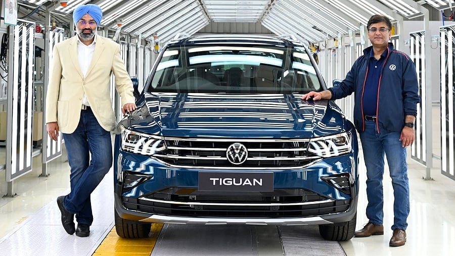 (From left) Gurpratap Boparai, Managing Director, SAVWIPL, and Ashish Gupta, Brand Director, Volkswagen Passenger Cars India, with the Tiguan