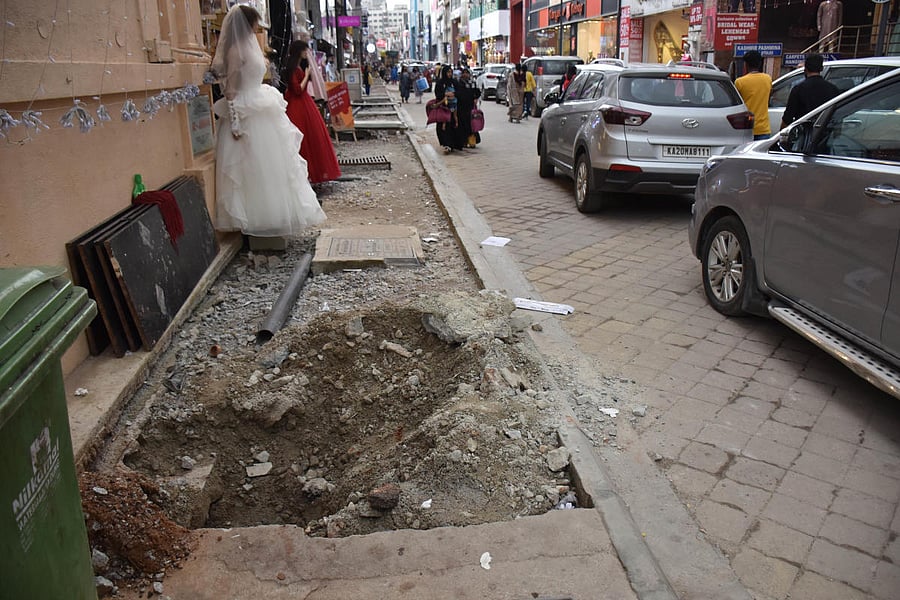 After a makeover that took 11 months, the street was opened in July. By August, the road was a mess again.