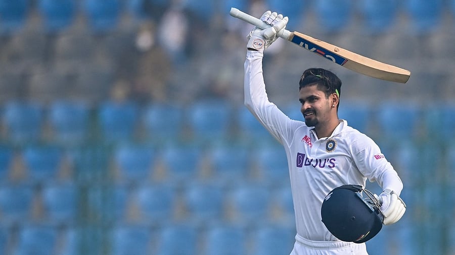 Shreyas Iyer celebrates after scoring a century. Credit: AFP Photo