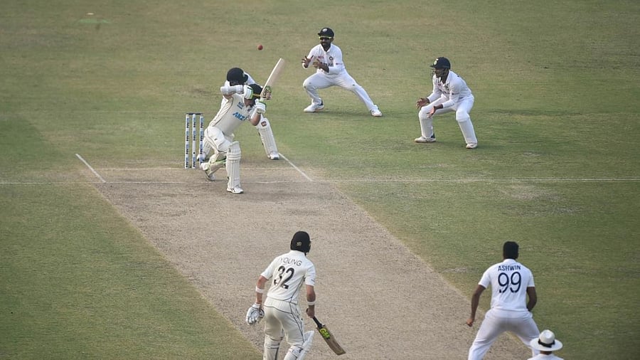 India's Ajinkya Rahane attempts to take the catch off New Zealand's Tom Latham during second day of the first test cricket match between India and New Zealand, at Green Park stadium in Kanpur. Credit: PTI Photo