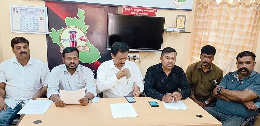 Town Panchayat member C K Prithvinath speaks at a press conference in Virajpet.