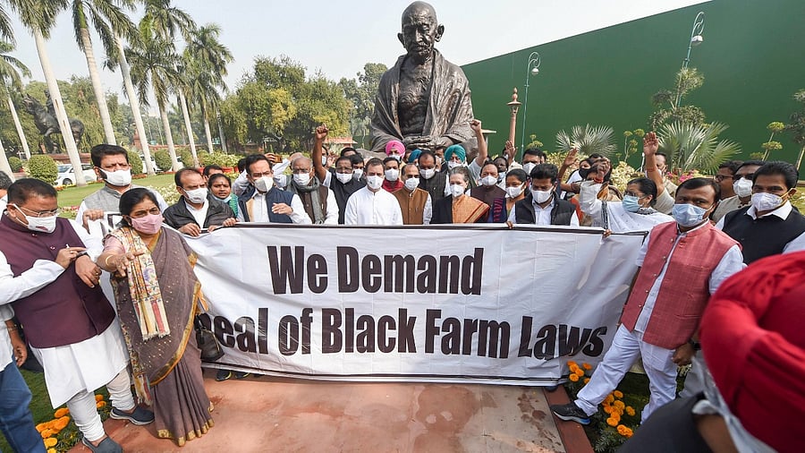 Congress protesting outside the Parliament complex. Credit: PTI Photo
