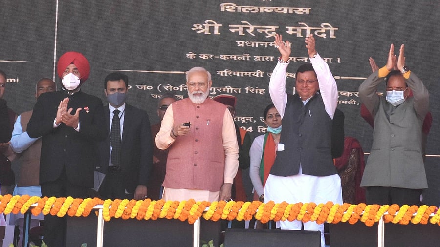 Prime Minister Narendra Modi with Uttarakhand Chief Minister Pushkar Singh Dhami and others during BJP election campaign rally ahead of state Assembly Election 2022. Credit: IANS Photo