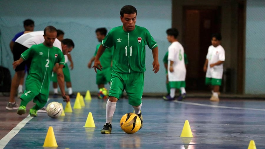 Members of the Iraqi football team for little people attend a training session at a fitness centre in the capital Baghdad on October 5, 2021 in preparation for international competitions. Credit: AFP Photo