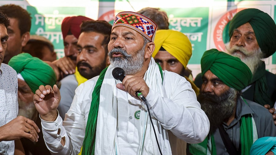 Bharatiya Kisan Union Spokesperson Rakesh Tikait addresses media after farmers' meeting at Singhu Border. Credit: PTI Photo