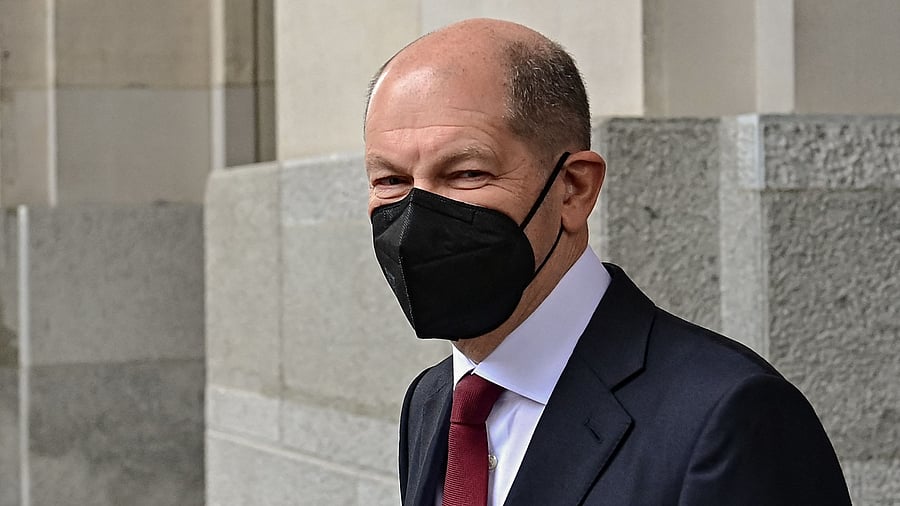 He won 395 of the 707 votes cast in the Bundestag lower house, and has pledged broad "continuity" with the popular Merkel. Credit: AFP Photo