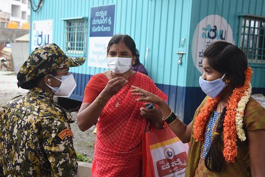 BBMP marshals collect fines from people who are not following Covid-19 norms. S K Dinesh