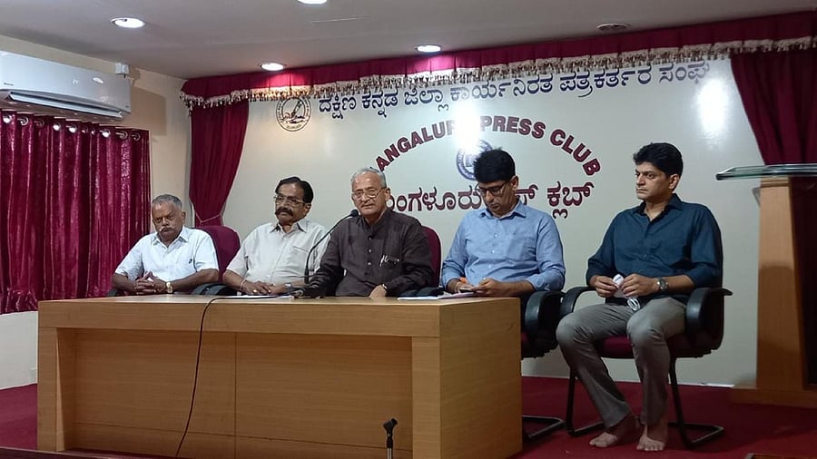 Former MLC Capt Ganesh Karnik speaks to media persons in Mangaluru. Credit: DH Photo