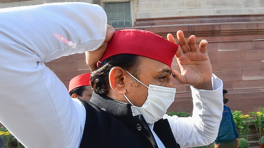 Akhilesh Yadav donning his trademark 'lal topi' in Parliament. Credit: PTI Photo