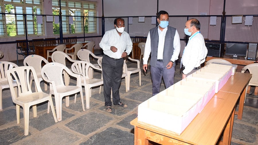 The returning officer takes stock of arrangements for counting of votes. Credit: DH Photo