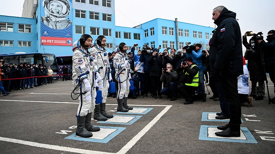 The International Space Station (ISS) crew report before they depart for the launch to the International Space Station (ISS) at the Baikonur Cosmodrome. Credit: Reuters File Photo