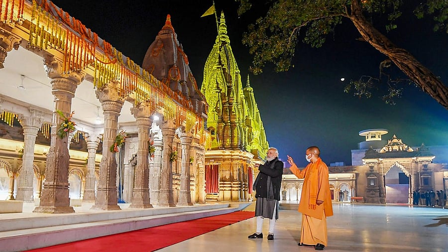 Prime Minister Narendra Modi with Chief Minister of Uttar Pradesh, Yogi Adityanath inspects the key development works, in Varanasi. Credit: PTI Photo
