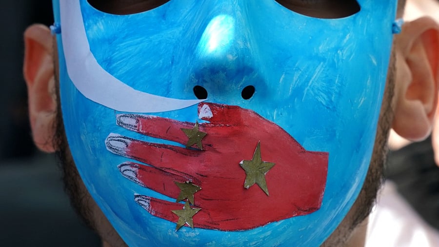 In this file photo taken on February 05, 2019, people protest at a Uyghur rally in front of the US Mission to the United Nations, to encourage the State Department to fight for the freedom of the majority-Muslim Uyghur population. Credit: AFP File Photo