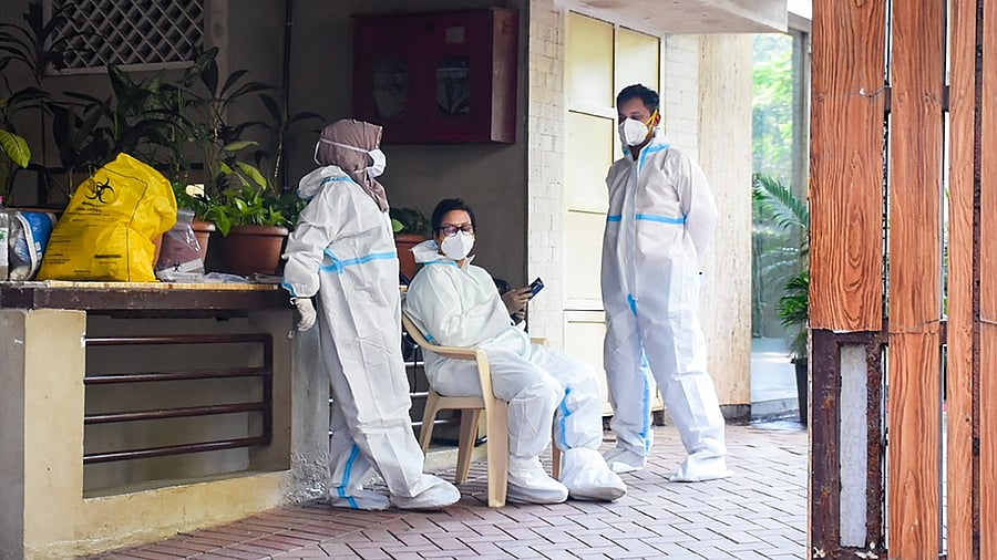 BMC workers seal Kareena Kapoor's residence after she tested positive for Covid-19. Credit: PTI Photo