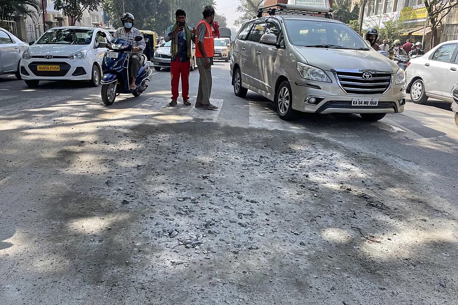 The eight-foot-deep sinkhole on JC Road, Bengaluru, was filled overnight. Credit: DH Photo/PUSHKAR V