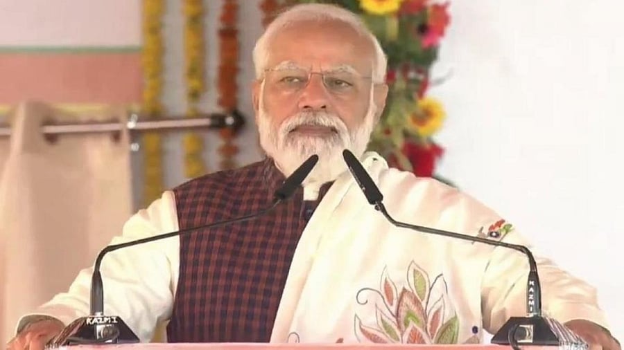 PM Modi addresses a public meeting at Shahjahanpur after laying the foundation of the Ganga Expressway. Credit: Twitter/@narendramodi