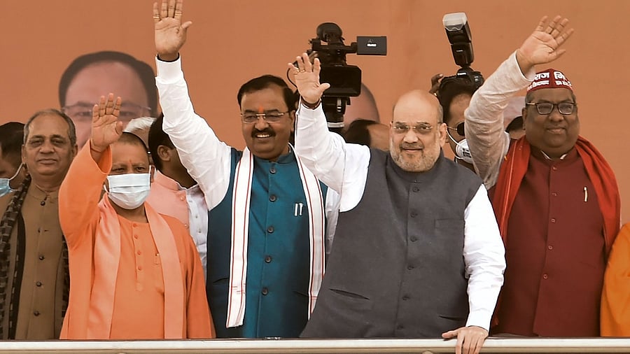 Union Home Minister Amit Shah, Uttar Pradesh Chief Minister Yogi Aditiyanath and Nishad Party President Sanjai Nishad at the joint rally of BJP and Nishad Party, in Lucknow. Credit: PTI File Photo